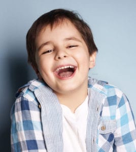 A Young boy laughing